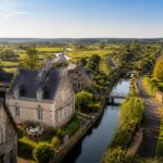 découvrez l'immobilier à carentan-les-marais : analyse des prix au m², potentiel de développement et les atouts uniques de ce territoire normand pour vos projets d'achat ou d'investissement.